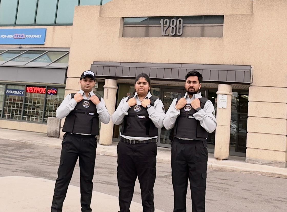 Delta Security guards in tactical vests at 1280 building